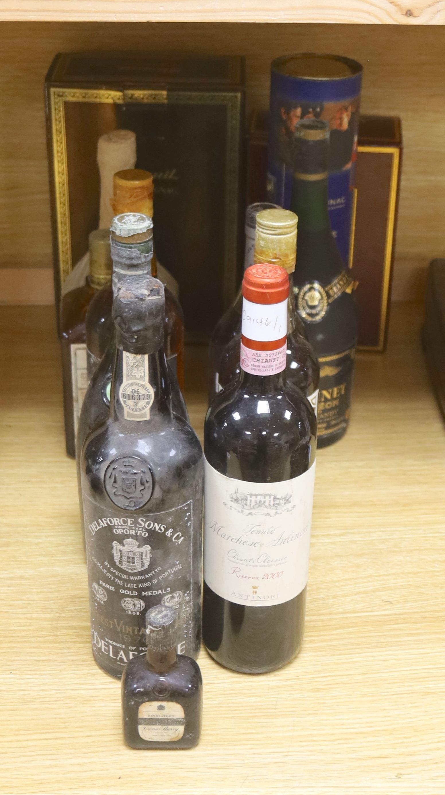 A quantity of spirits, including Remy Martin Pasquit fine cognac, Martell Cordon Bleu 24fl oz. and a bottle of Chianti Classico 2000